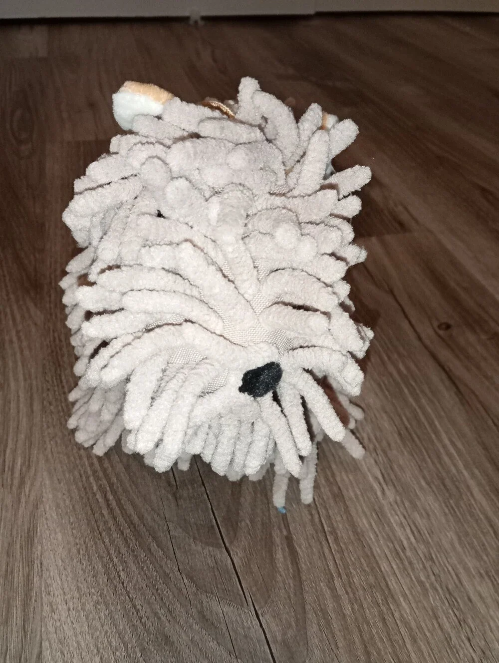 Hand towel:  Plush Mop Dog Hand Towel Light Gray and beige.